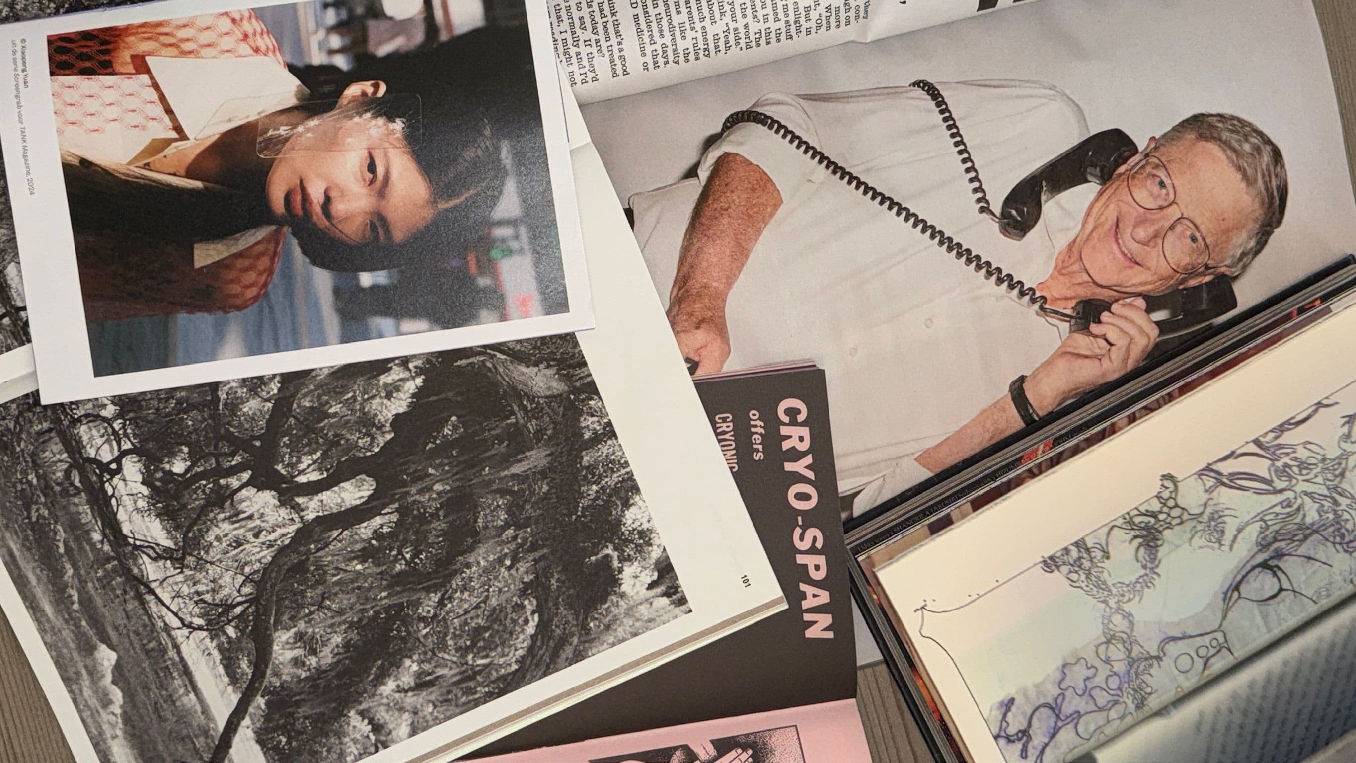 Image of magazine lying open on top of each other